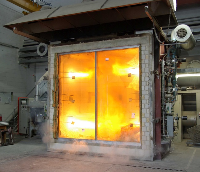 SCHOTT conducts preliminary fire tests on fire-rated glazing in its own large-scale furnace Hot furnace used for conducting fire tests on fire-rated glazing
